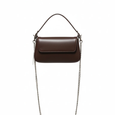 کیف زنانه مدل «دِلیا کافی» – کیف دستی چرمی با زنجیر نقره‌ای