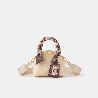 کیف دستی مینی مدل «لِوِسا مینی» – کیف چرمی با دسته‌ دستمالی طرح‌دار